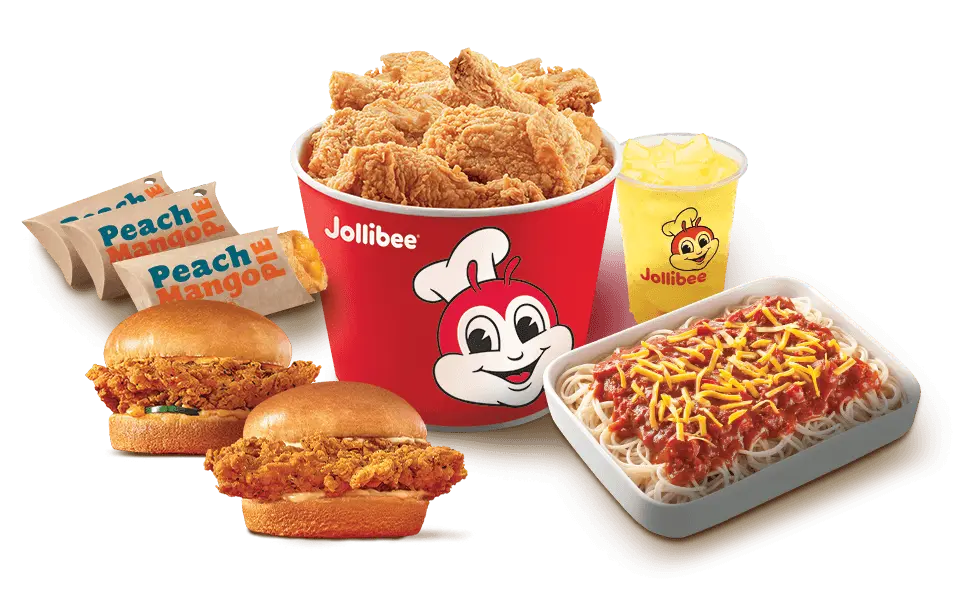 Jollibee bucket treat with chicken sandwiches, peach mango pies, jolly spaghetti, and pineapple quencher.